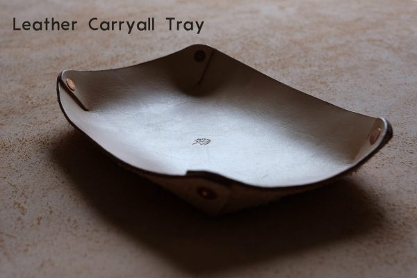 lerif designs leather carryall tray on a beige background