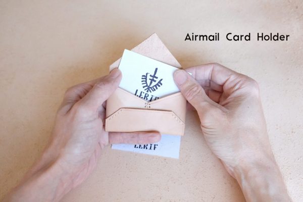 lerif designs leather airmail business card holder with brand card peeking out