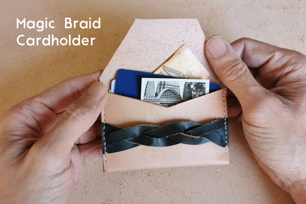 lerif designs magic braid cardholder in indigo and natural on beige background