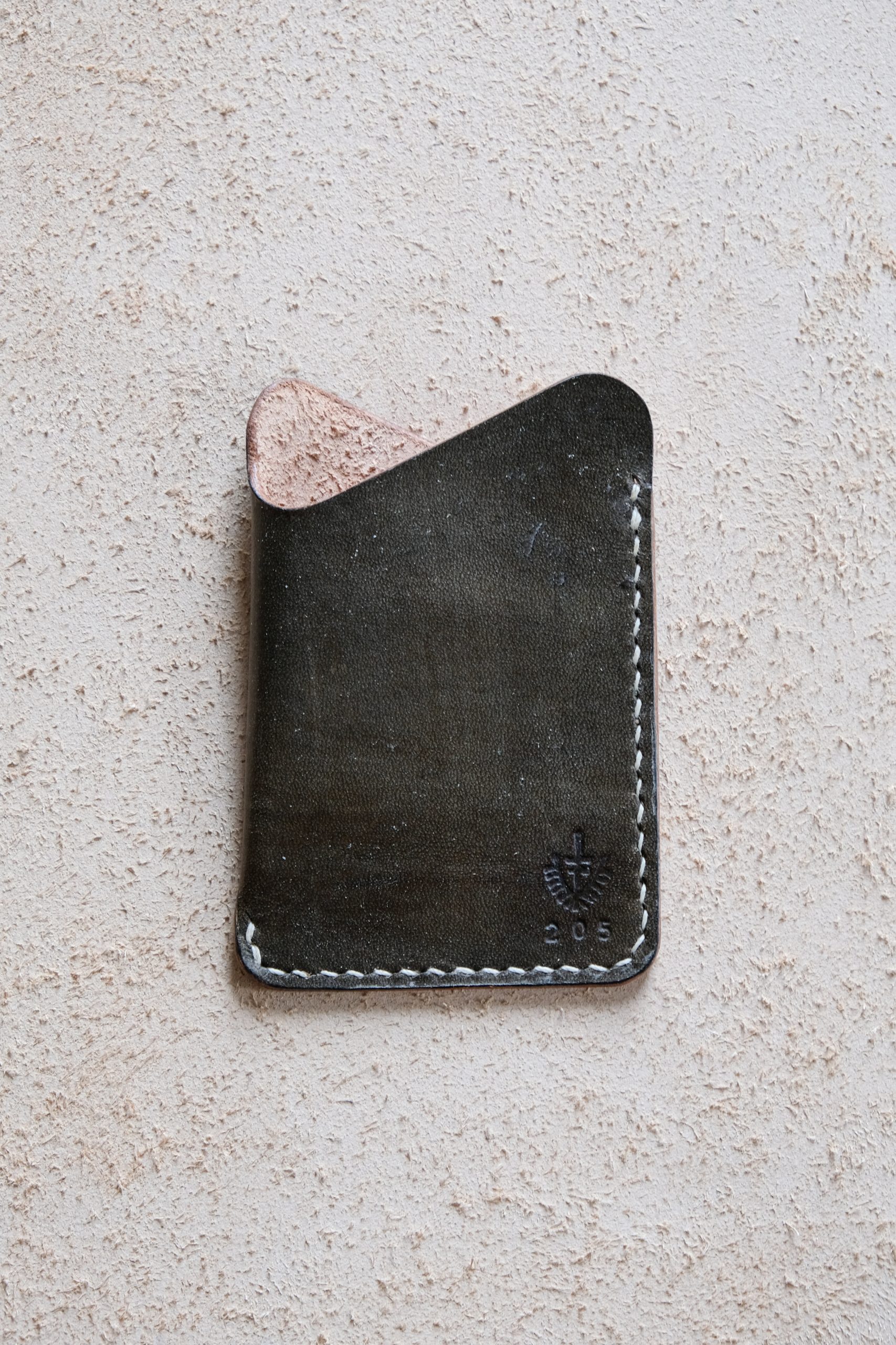 lerif designs leather wave cardholder vinegaroon on beige background